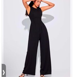 NWT S (M good) Black stretch seamed pockets wide leg zipper back jumpsuit
